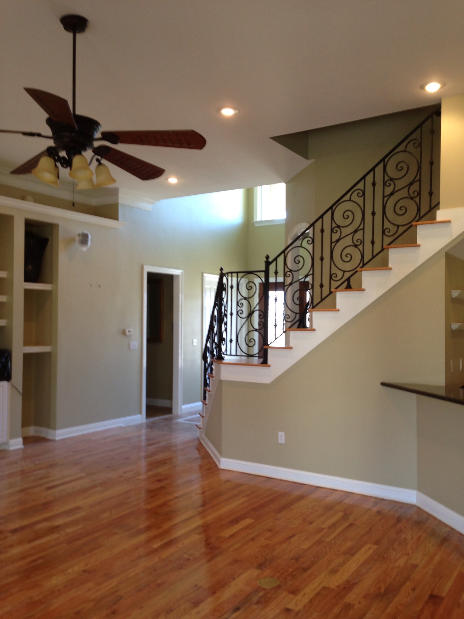 Staircase with decorative wrought iron railing